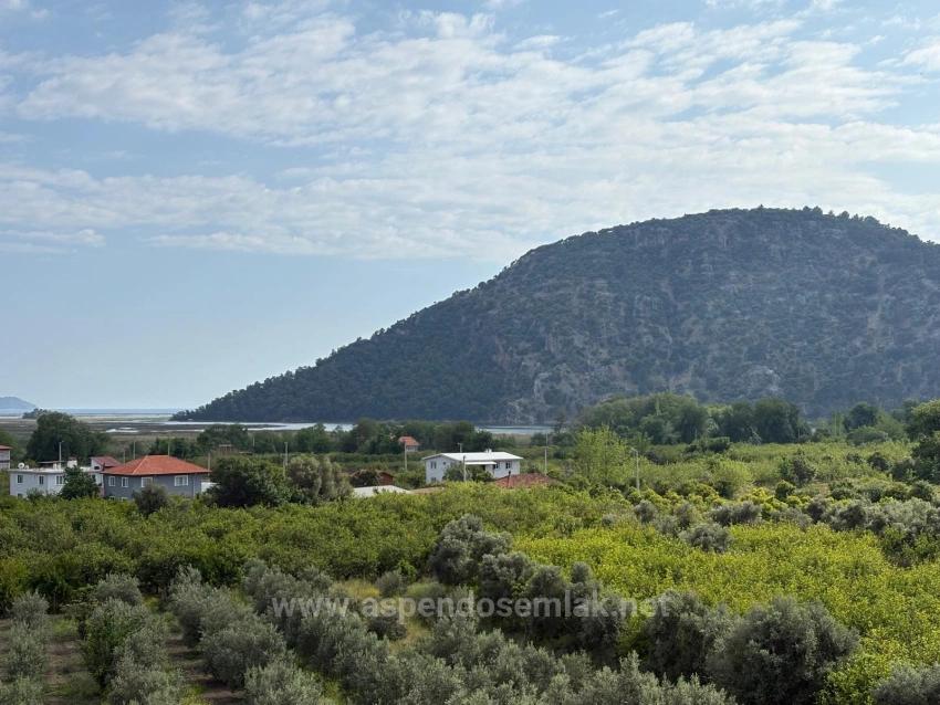 1.721 M² Großes Grundstück In Çandır Village Mit Meer- Und Seeblick Zu Verkaufen.