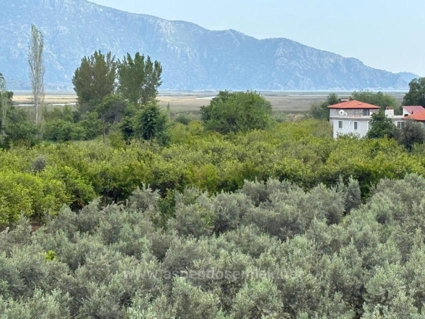 1.721 M² Großes Grundstück In Çandır Village Mit Meer- Und Seeblick Zu Verkaufen.