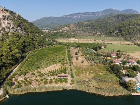 Im Köyceğiz Çandır Mahallesinde kanala sıfır 20.000m2 satılık Feld
