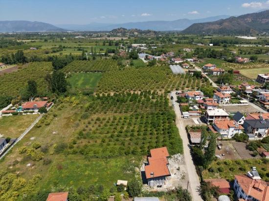 Land For Sale In Okçular, 1050m2, In The Village Residential Area.