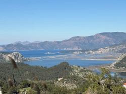 Продается Земельный Участок Площадью 1000 М2 С Видом На Море В Жилом Районе Деревни Гёкбель.